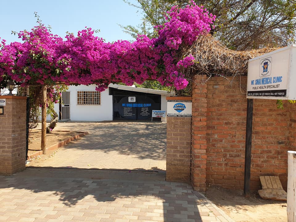 MT. Sinai Medical Clinic entrance with beautiful bougainvillea flowers